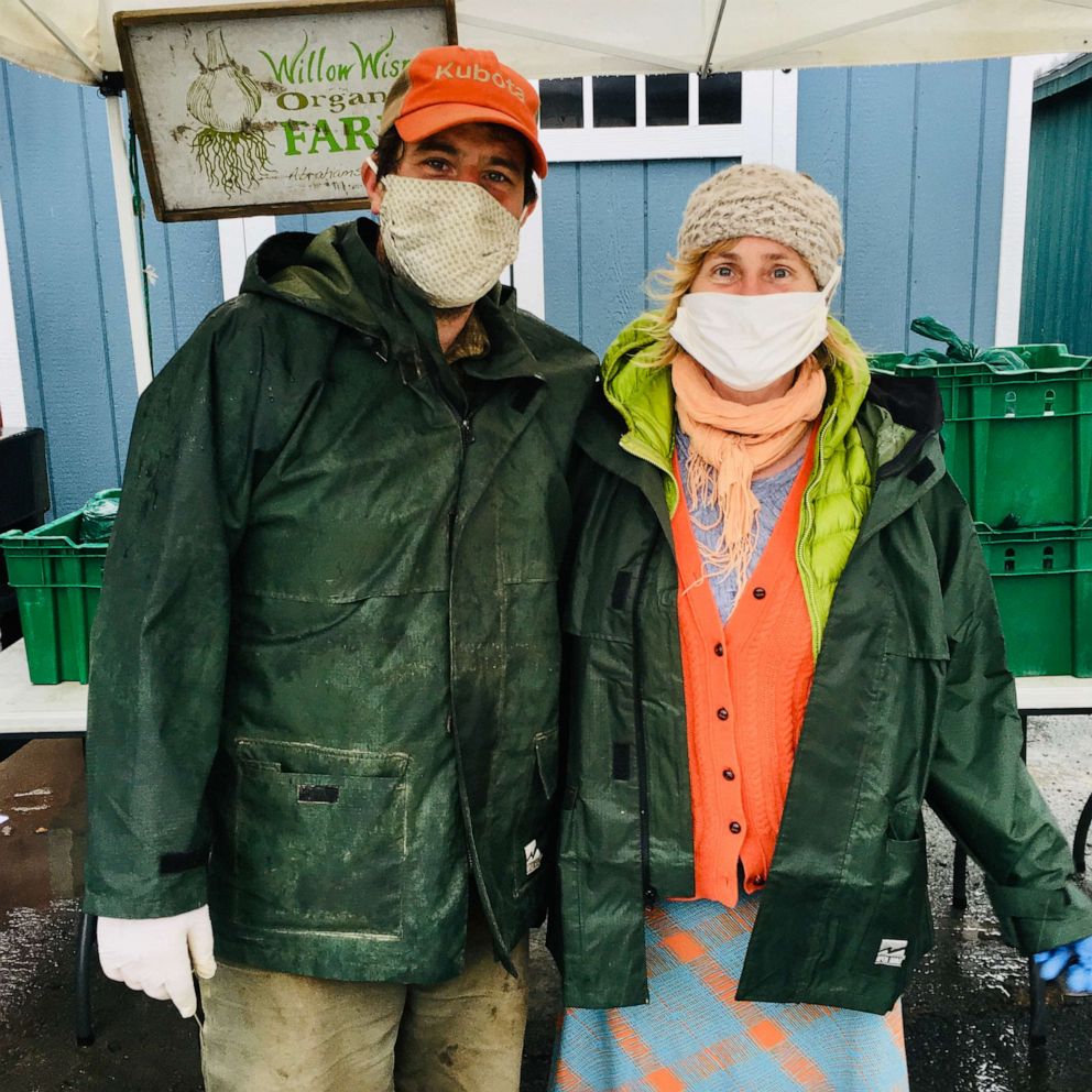 PHOTO: Greg Swartz and Tannis Kowalchuk distributing Farmers Choice Mixed bags during the pandemic.  
