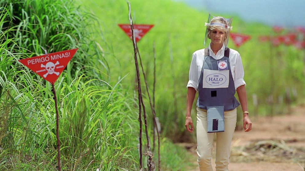PHOTO: Diana, Princess of Wales wears protective body armor and a visor while visiting a landmine minefield being cleared by the charity Halo in Huambo, Angola, Jan. 15, 1997.