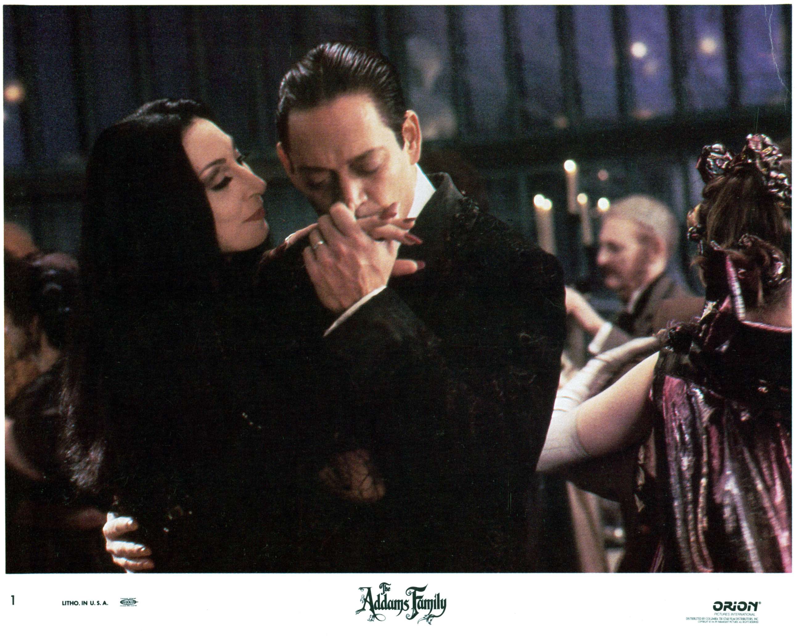 PHOTO: Anjelica Huston is kissed by Raul Julia in a scene from the film "The Addams Family."