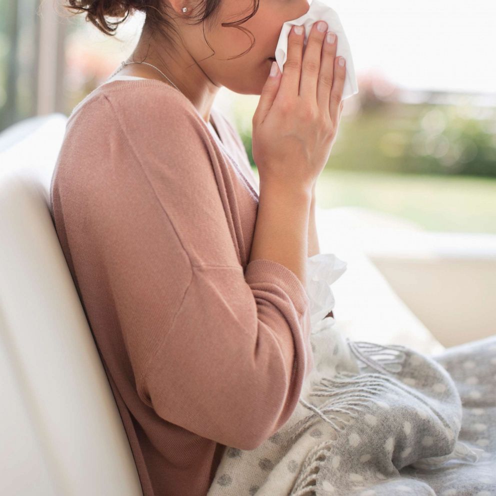 PHOTO:A woman blows her nose in this undated stock photo.