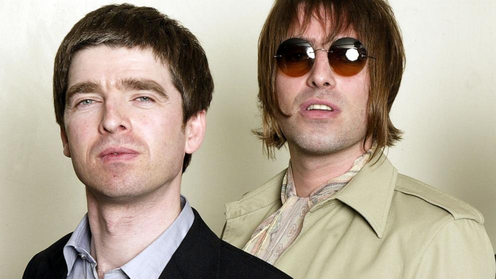 PHOTO: Noel and Liam Gallagher of rock band Oasis attend a charity concert for the Teenage Cancer Trust at the Royal Albert Hall, March 26, 2003, in London.