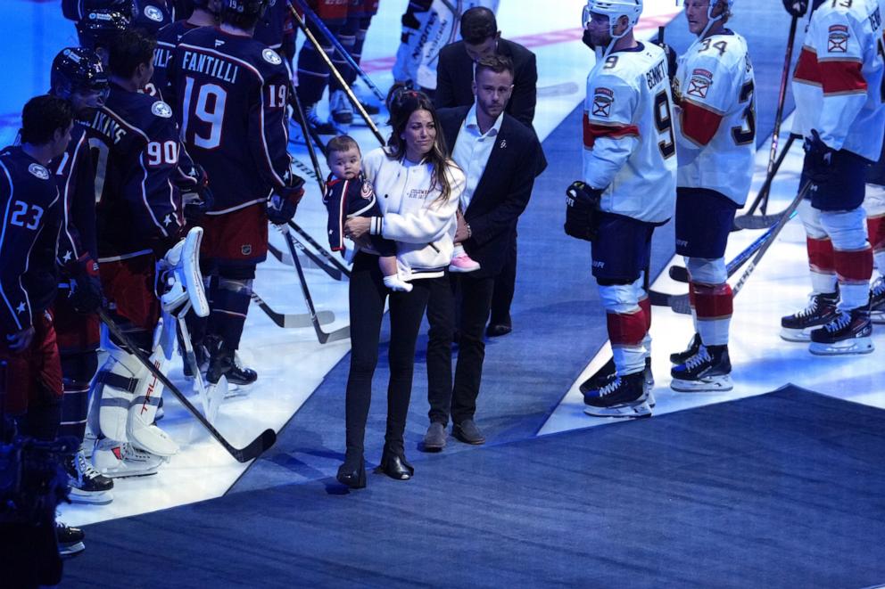 PHOTO: Meredith Gaudreau walks onto the ice during a remembrance for her husband, Columbus Blue Jackets player Johnny Gaudreau before the home opener against the Florida Panthers at Nationwide Arena in Columbus, Ohio, Oct. 15, 2024.