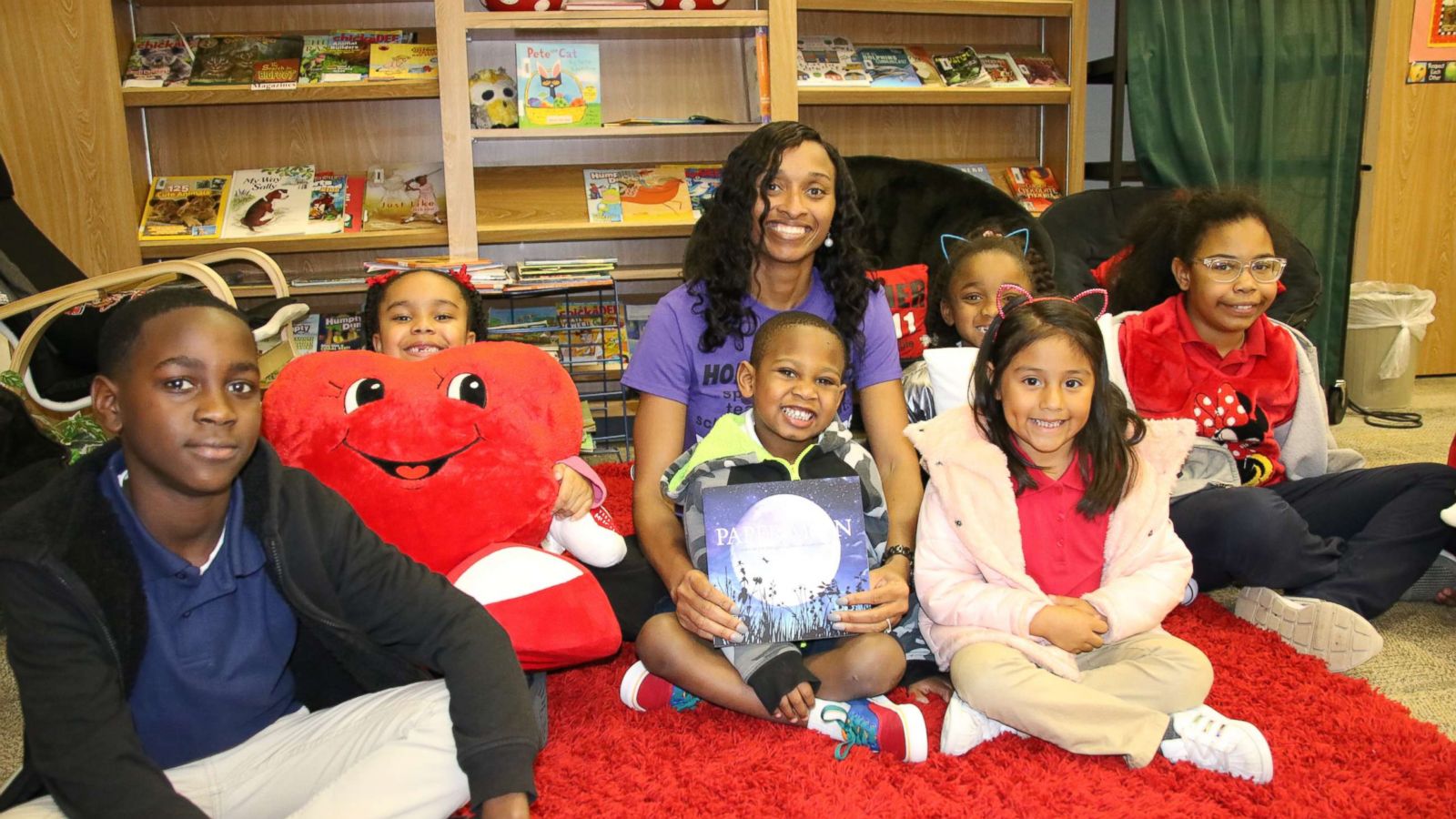 PHOTO: Dr. Belinda George reading to Homer Drive Elementary School students.