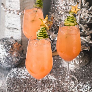 PHOTO: These festive Christmas tree tonics use cucumber as a holiday garnish.