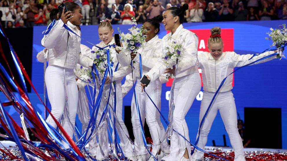 Jordan Chiles, Jade Carey, Simone Biles, Suni Lee and alternate Joscelyn Roberson celebrate after being selected for the 2024 U.S. Olympic Women's Gymnastics Team on June 30, 2024, in Minnesota. (Photo by Elsa/Getty Images)