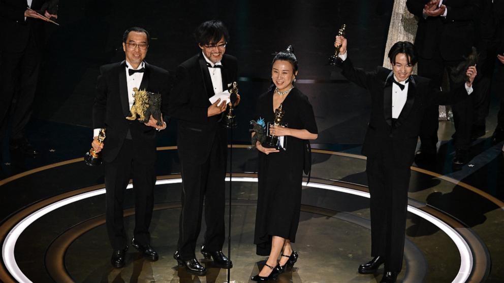 PHOTO: Masaki Takahashi, Takashi Yamazaki, Kiyoko Shibuya and Tatsuji Nojima accept the award for Best Visual Effects for "Godzilla Minus One" during the 96th Annual Academy Awards in Hollywood, CA, March 10, 2024.