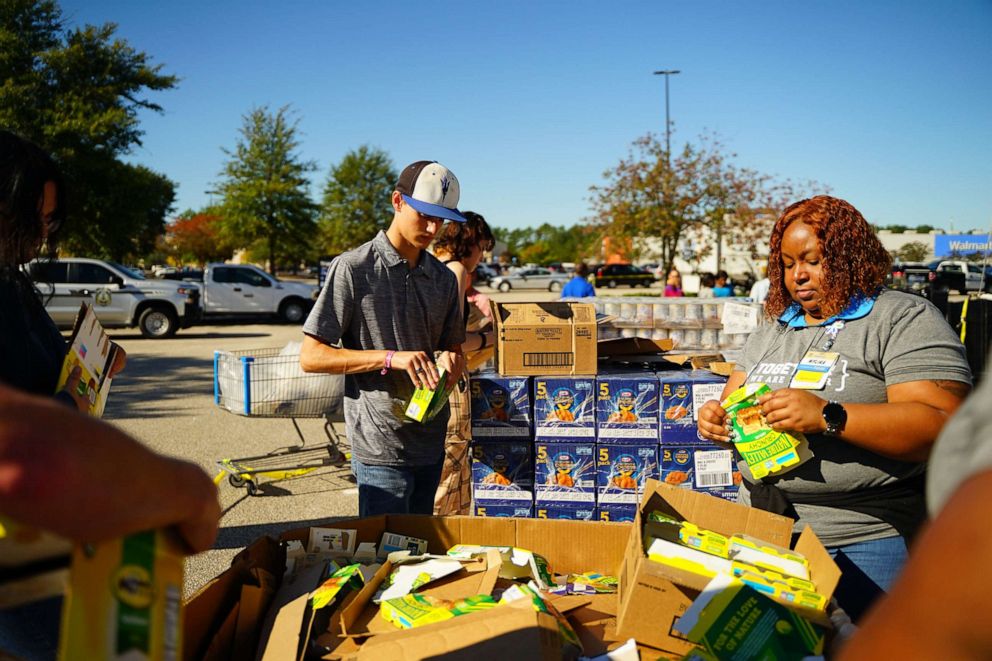 PHOTO: Volunteers pack boxes for Greg's Groceries Packing Day on Oct. 5, 2022.