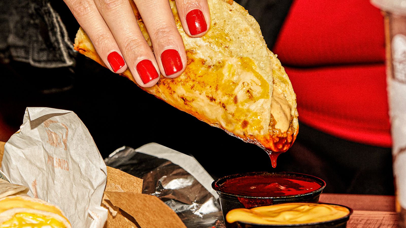 PHOTO: The new grilled cheese dipping taco with two dipping sauces and slow-braised beef at Taco Bell.