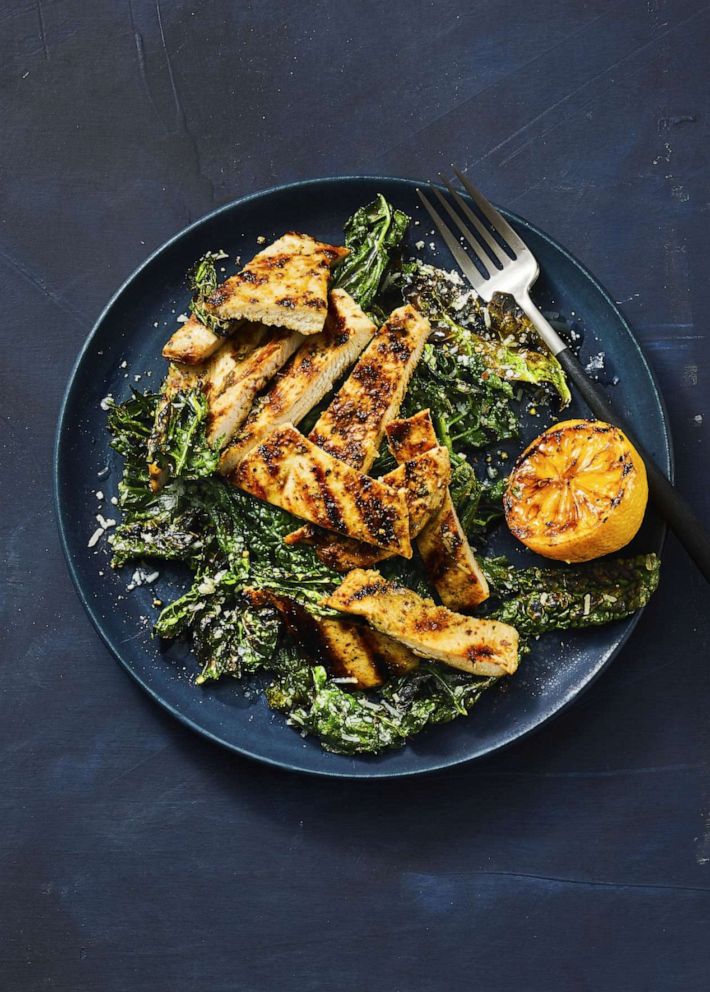 PHOTO: Grilled lemony chicken and kale âCaesarâ. Good Housekeeping Savor Weeknight July/Aug 2022