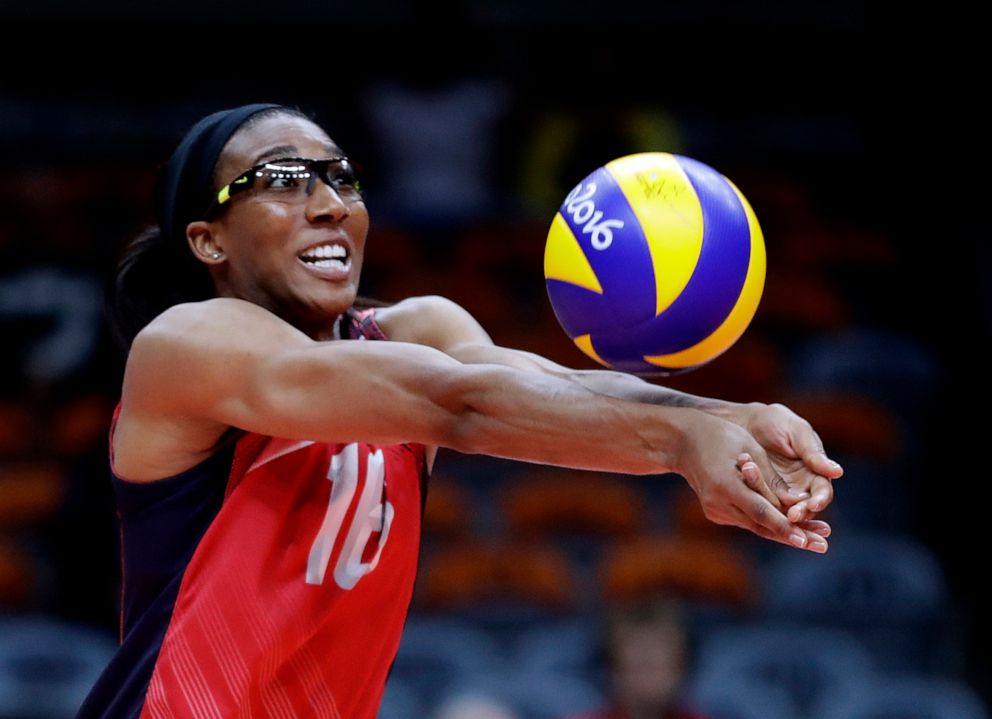 PHOTO: The United States' Foluke Akinradewo Gunderson bumps during a women's preliminary volleyball match against Italy at the Summer Olympics in Rio de Janeiro, Brazil, Aug. 12, 2016. 