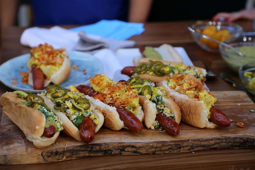 PHOTO: Hot dogs with corn and jalapenos and potato salad and BBQ chips.