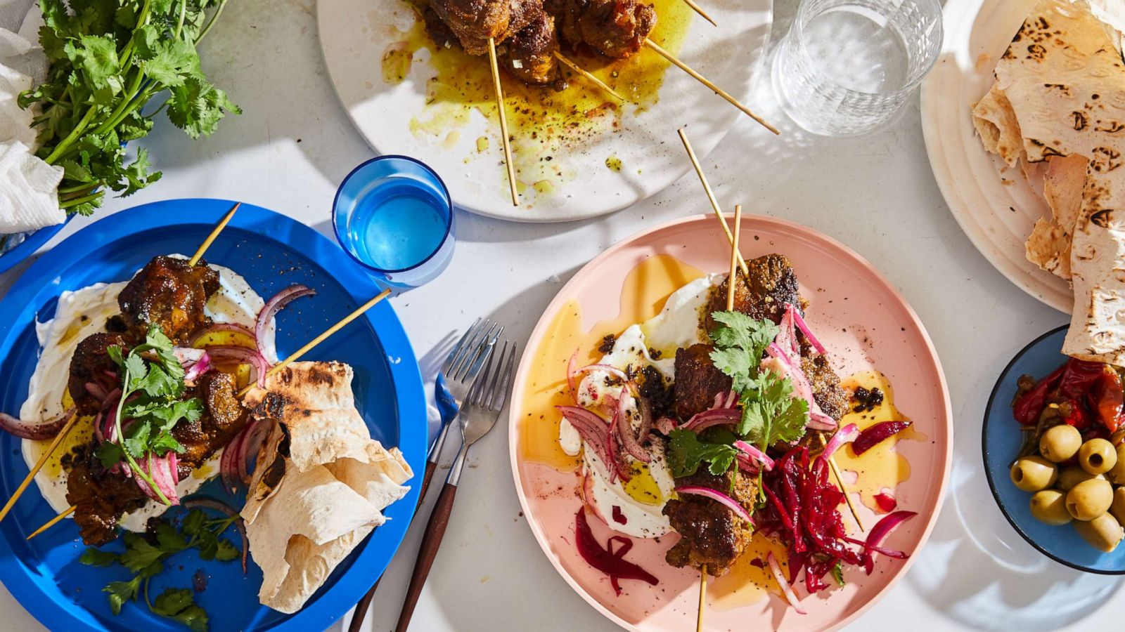 PHOTO: Alison Roman's spiced lamb skewers with lemony onions.