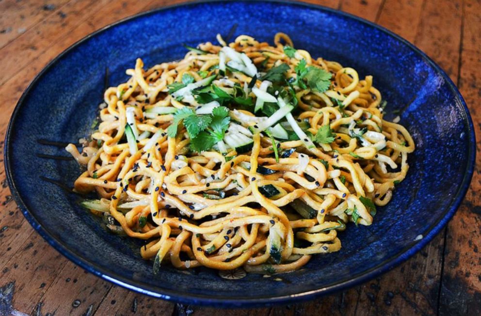 PHOTO: Peanut-sesame noodles topped with fresh cilantro, scallions and cucumbers.