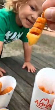 PHOTO: Lorenzo got very excited when his mom Diane dipped an Arbys french fry into melted cheese.