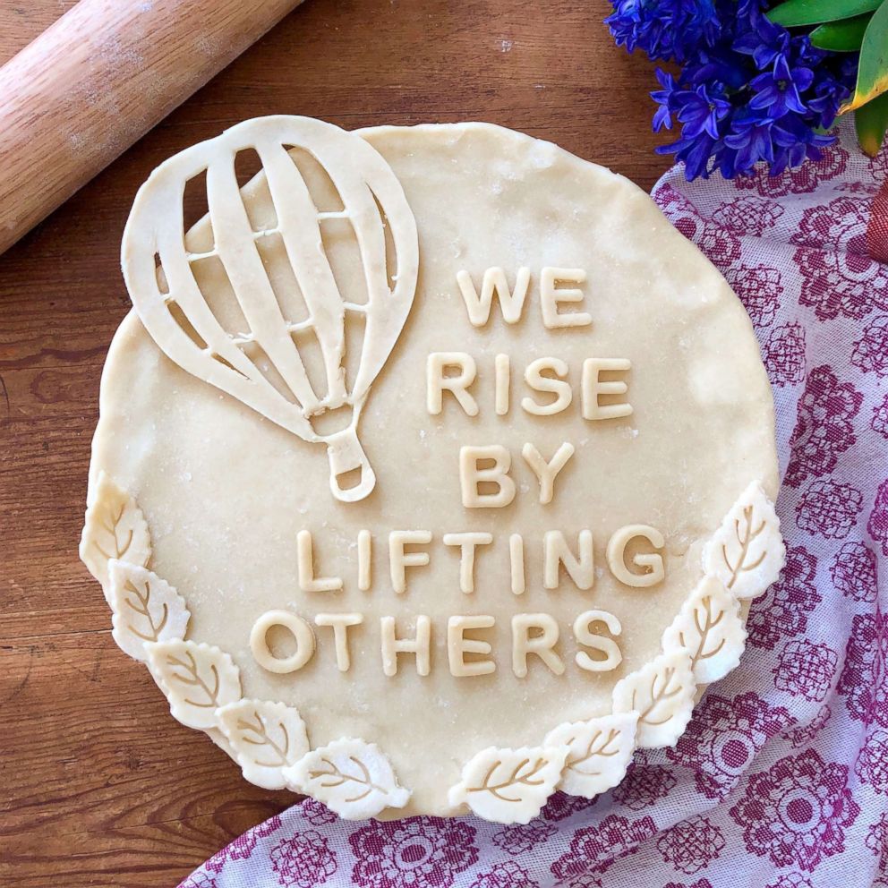 PHOTO: A pie crust with an uplifting message made by Marie Saba.