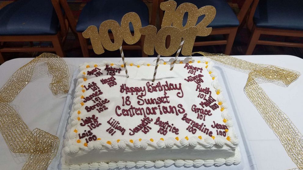 PHOTO: The birthday cake for 18 centenarians at the Sunset Retirement Community.