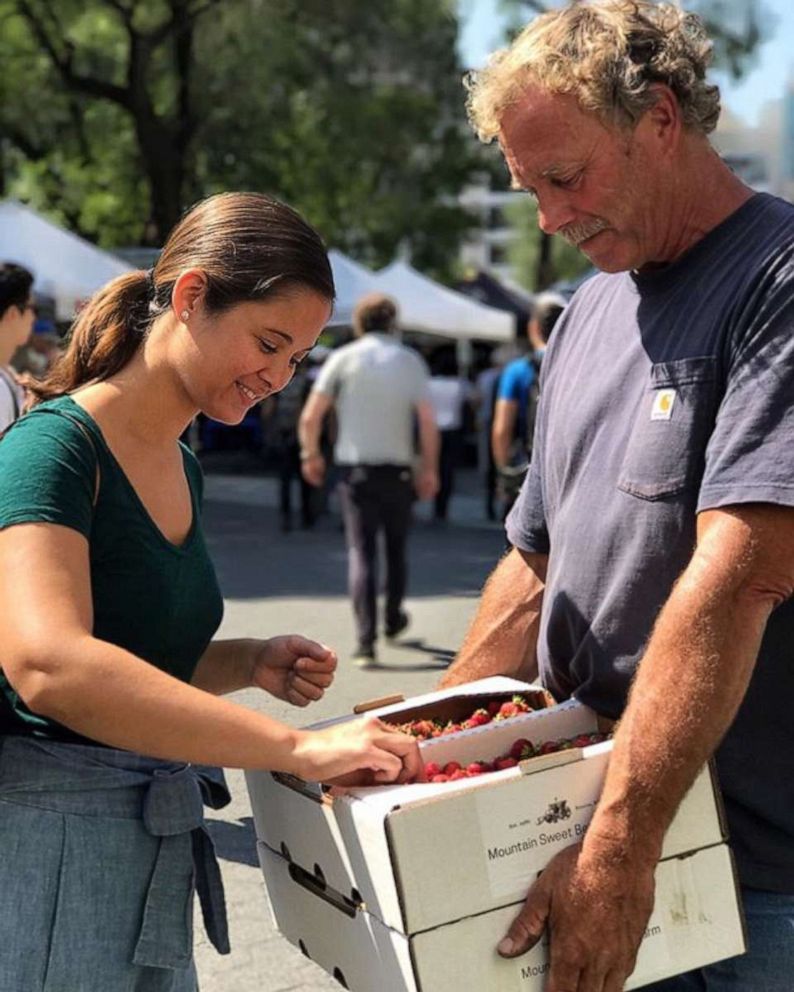 PHOTO: Suzanne Cupps at the Union Square Greenmarket purchasing fresh produce.