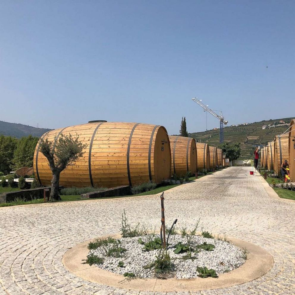 PHOTO: A row of wine barrel hotel rooms at Quinta da Pacheca in Lamego, Portugal. 