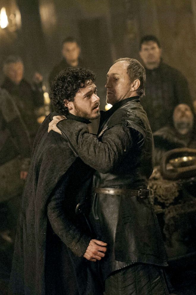  Richard Madden, left, as Robb Stark and Michael McElhatton as Roose Bolton in a scene from 'Game of Thrones.'					