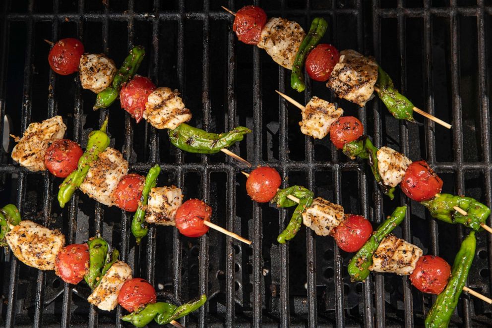 PHOTO: Grilled halibut skewers with cherry tomatoes and shishito peppers.