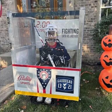 PHOTO: Blake, 11, who was born with spina bifida, built his Halloween costume, a hockey penalty box, around his wheelchair.