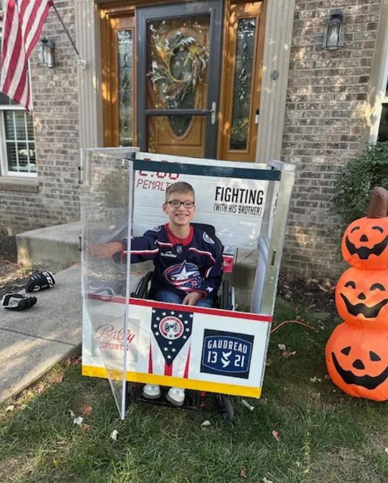 PHOTO: Blake, 11, who was born with spina bifida, built his Halloween costume, a hockey penalty box, around his wheelchair.