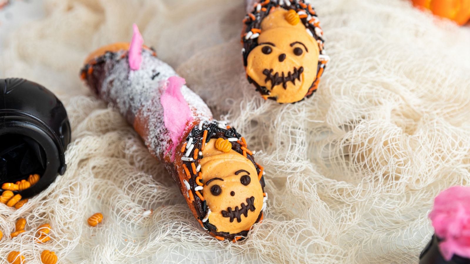 PHOTO: A Jack-o-Lantern decorated pumpkin pie cream-filled cannoli.