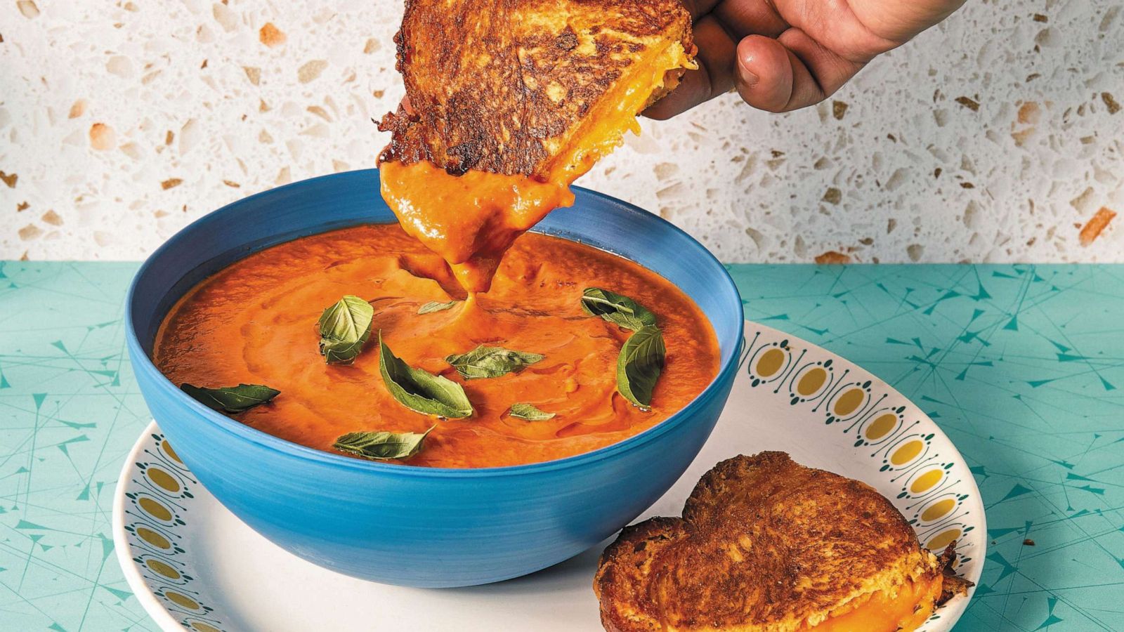 PHOTO: Harissa tomato bisque with challah grilled cheese.