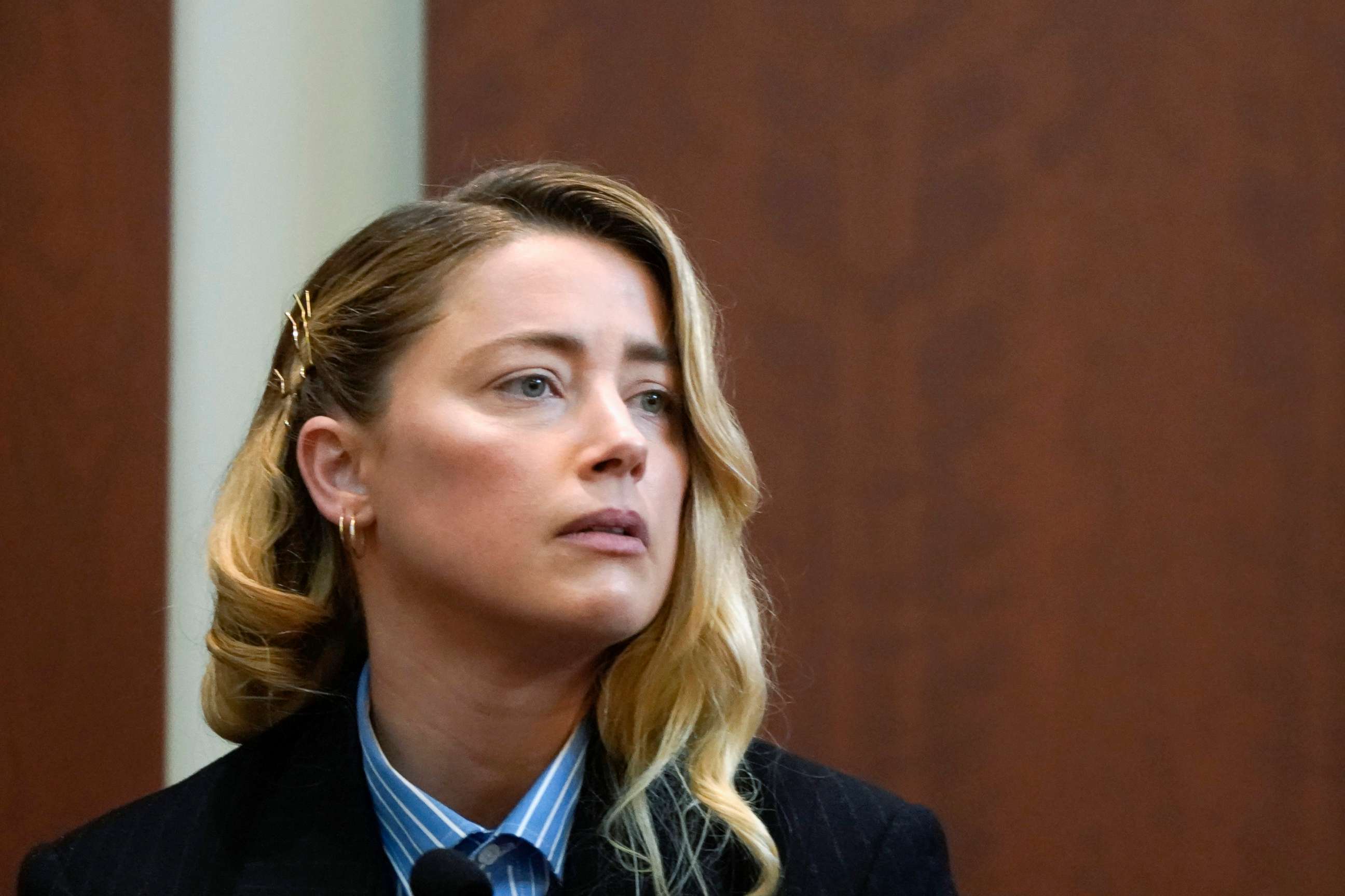 PHOTO: Amber Heard testifies in the courtroom at the Fairfax County Circuit Court in Fairfax, Va., May 4, 2022.