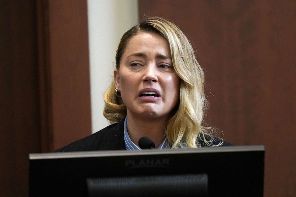 PHOTO: Amber Heard testifies about the first time her ex-husband, actor Johnny Depp hit her, at Fairfax County Circuit Court during a defamation case against her by Depp in Fairfax, Va., May 4, 2022. 