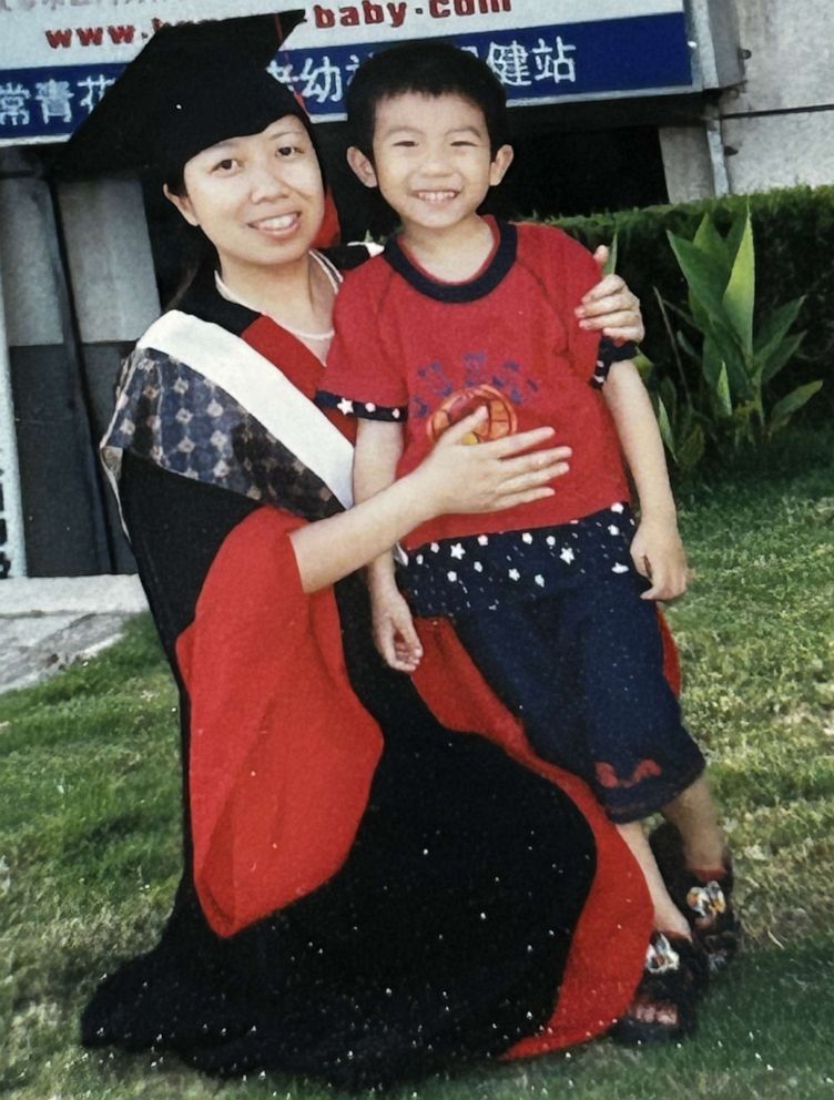 PHOTO: Wenjing Cao with her son Hefei Liu when he was a young boy.