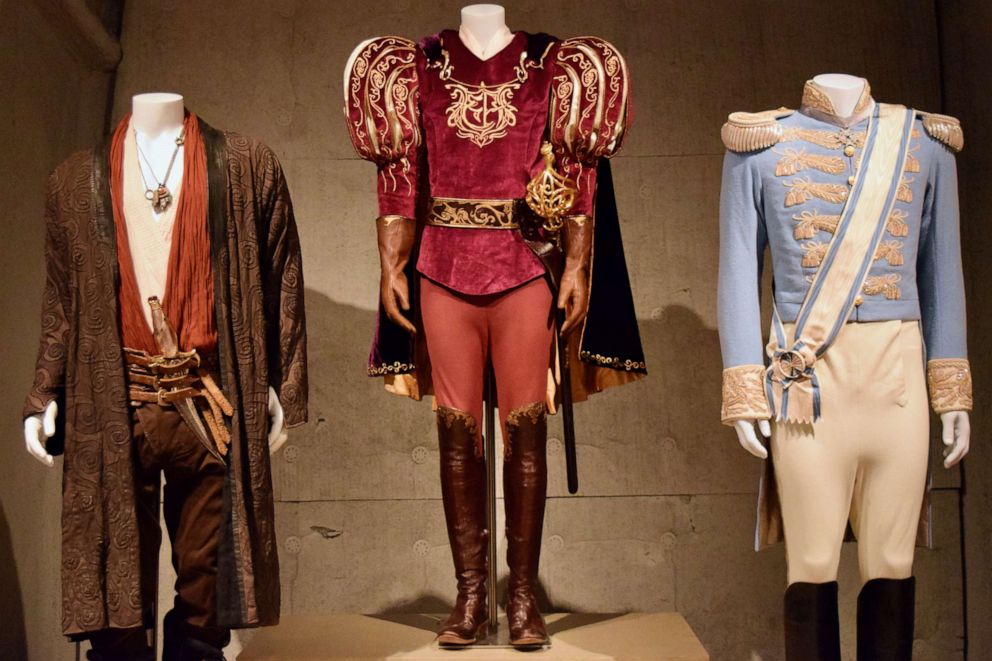 PHOTO: A trio of heroic costumes: Dastan’s (Jake Gyllenhaal) from The Prince of Persia: The Sand of Time (2010) Prince Edward (James Marsden) from Enchanted (2007), and the Prince (Richard Madden) from Cinderella (2015).
