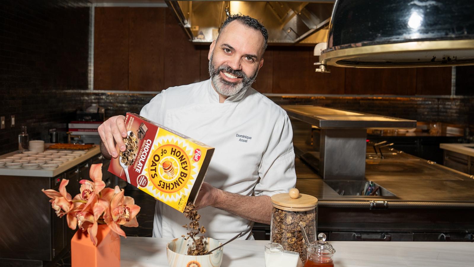 PHOTO: Chef Dominique Ansel pours a bowl of new Honey Bunches of Oats Chocolate cereal.