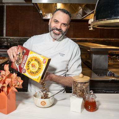 PHOTO: Chef Dominique Ansel pours a bowl of new Honey Bunches of Oats Chocolate cereal.