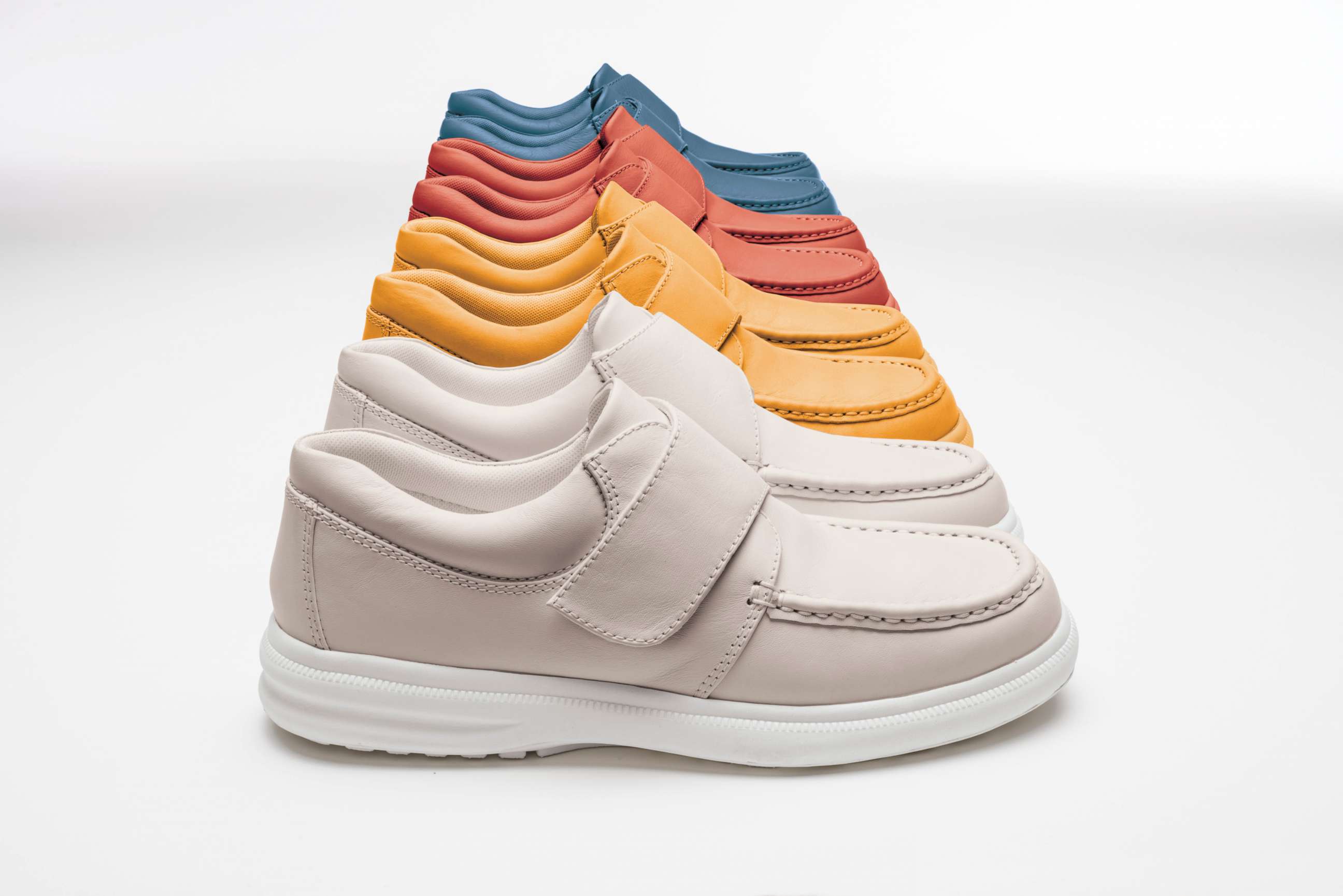 PHOTO: Crafted in smooth full grain leather, Hush Puppies' Gil slip-on men’s sneakers are for guys of every generation thanks to the new range of colors that up the fashion ante on these traditional sneakers.