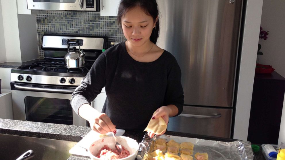 Umamicart co-founder Andrea Xu makes homemade dumplings in her kitchen.