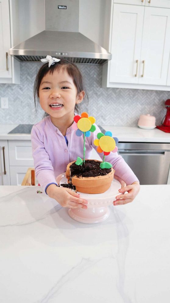 PHOTO: Ellis Tang with a potted flower cake modeled after a picture she drew.