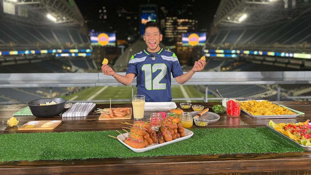 PHOTO: Chef Shota Nakajima prepares game-day snacks to kickoff football season at Lumen Field in Seattle, Washington.