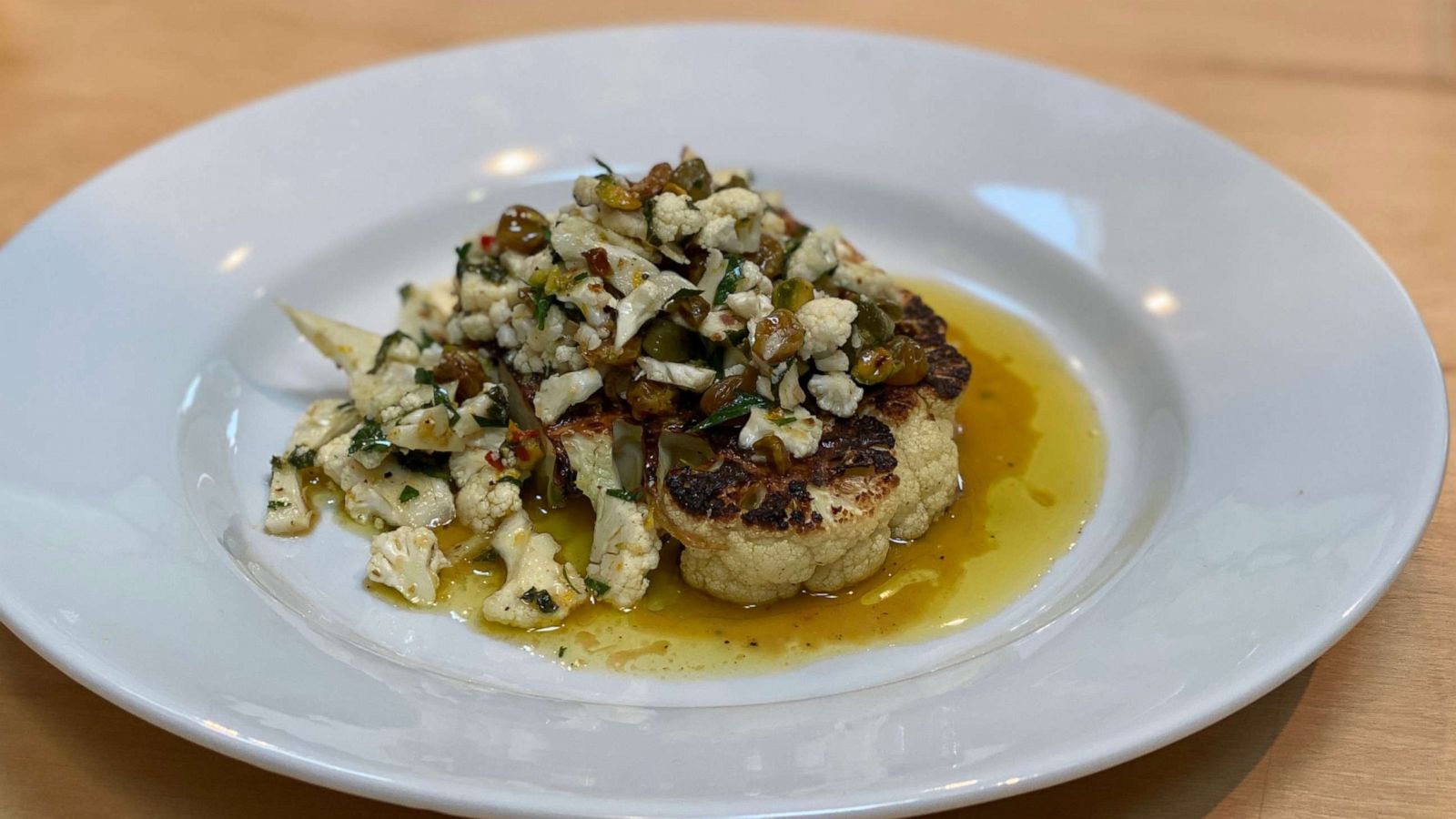 PHOTO: Chef Michael Symon's grilled cauliflower steak with chimichurri.