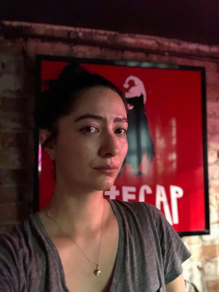 PHOTO: A tearful Natasha David stands inside her bar Nitecap after making the decision to close for good.