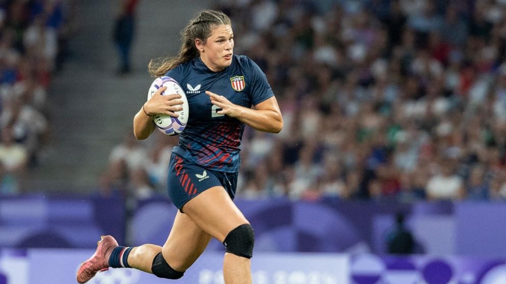 PHOTO: Ilona Maher of the United States Women's National Team runs with the ball during a women's quarter final match against Great Britain at the 2024 Paris Olympic Games, July 29, 2024.