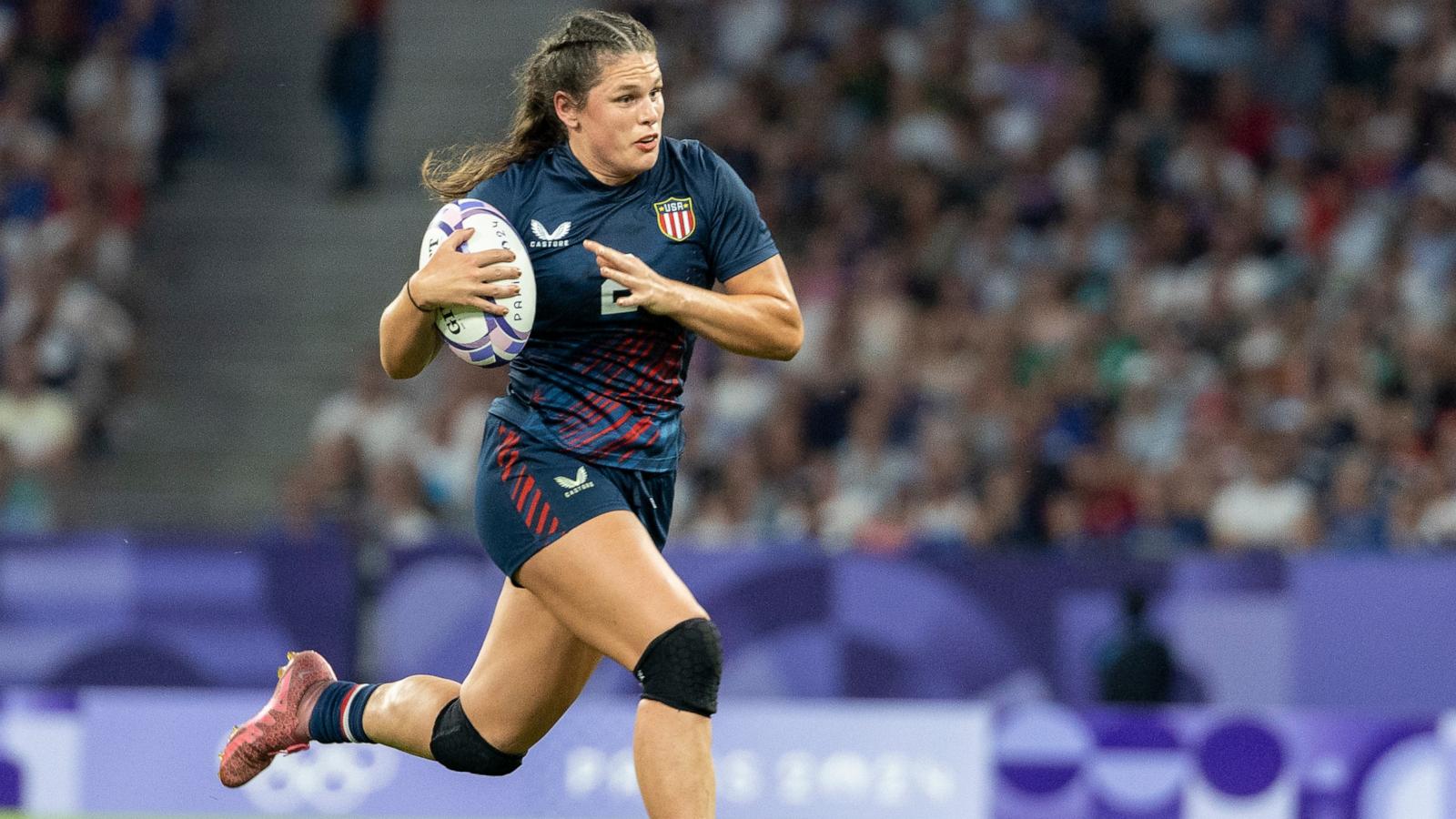 PHOTO: Ilona Maher of the United States Women's National Team runs with the ball during a women's quarter final match against Great Britain at the 2024 Paris Olympic Games, July 29, 2024.