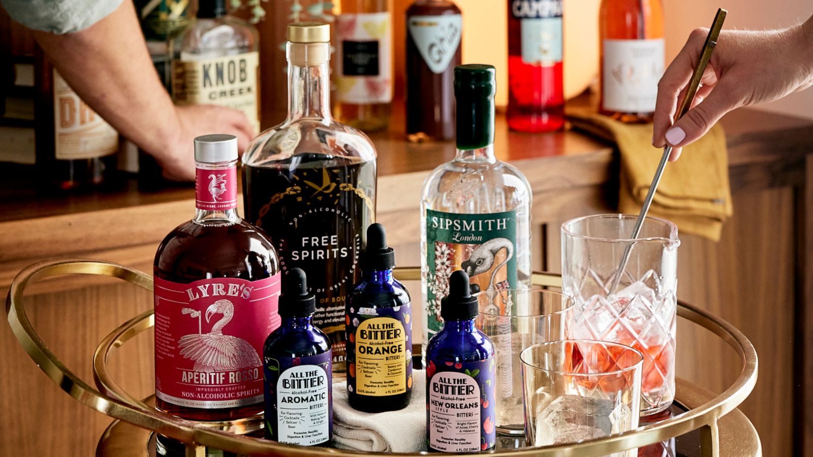 PHOTO: A bar cart with non-alcoholic spirit alternatives and zero-proof bitters.