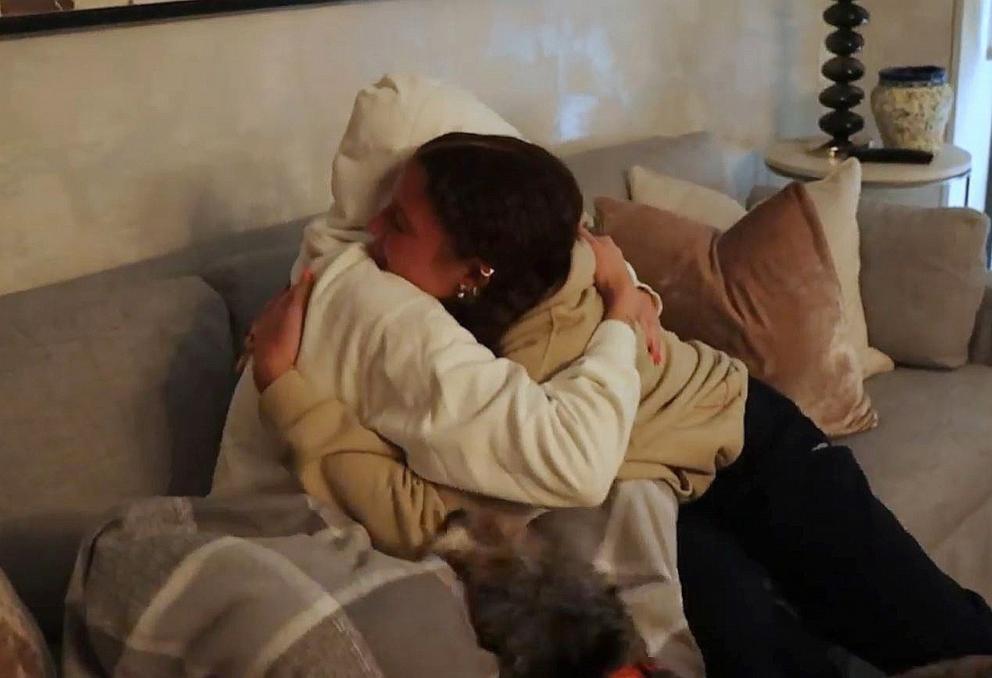 PHOTO: Isabella Strahan hugs her twin sister, Sophia, who flew into New York City to surprise her.