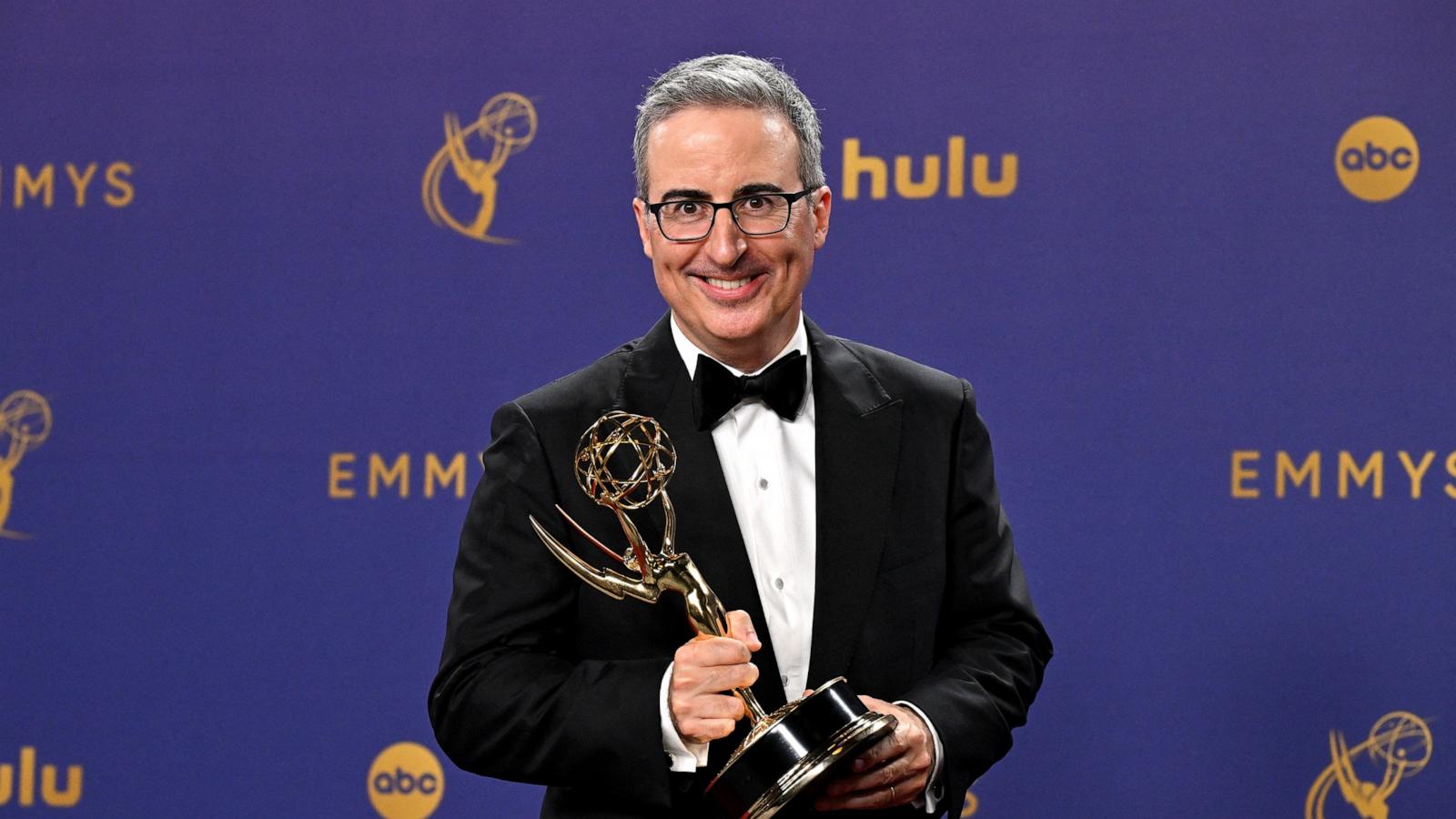 PHOTO: John Oliver, winner of the Outstanding Scripted Variety Series Award for "Last Week Tonight with John Oliver", poses in the press room during the 76th Emmy Awards at the Peacock Theatre at L.A. Live in Los Angeles on September 15, 2024.