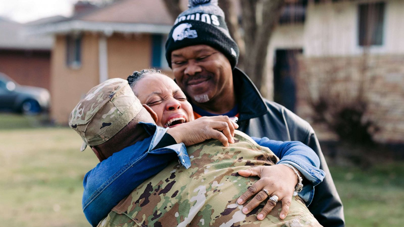 PHOTO: Senior Airman Jaylen Spotts gives his mom a hug after surprising her and his father in an emotional reunion this week.