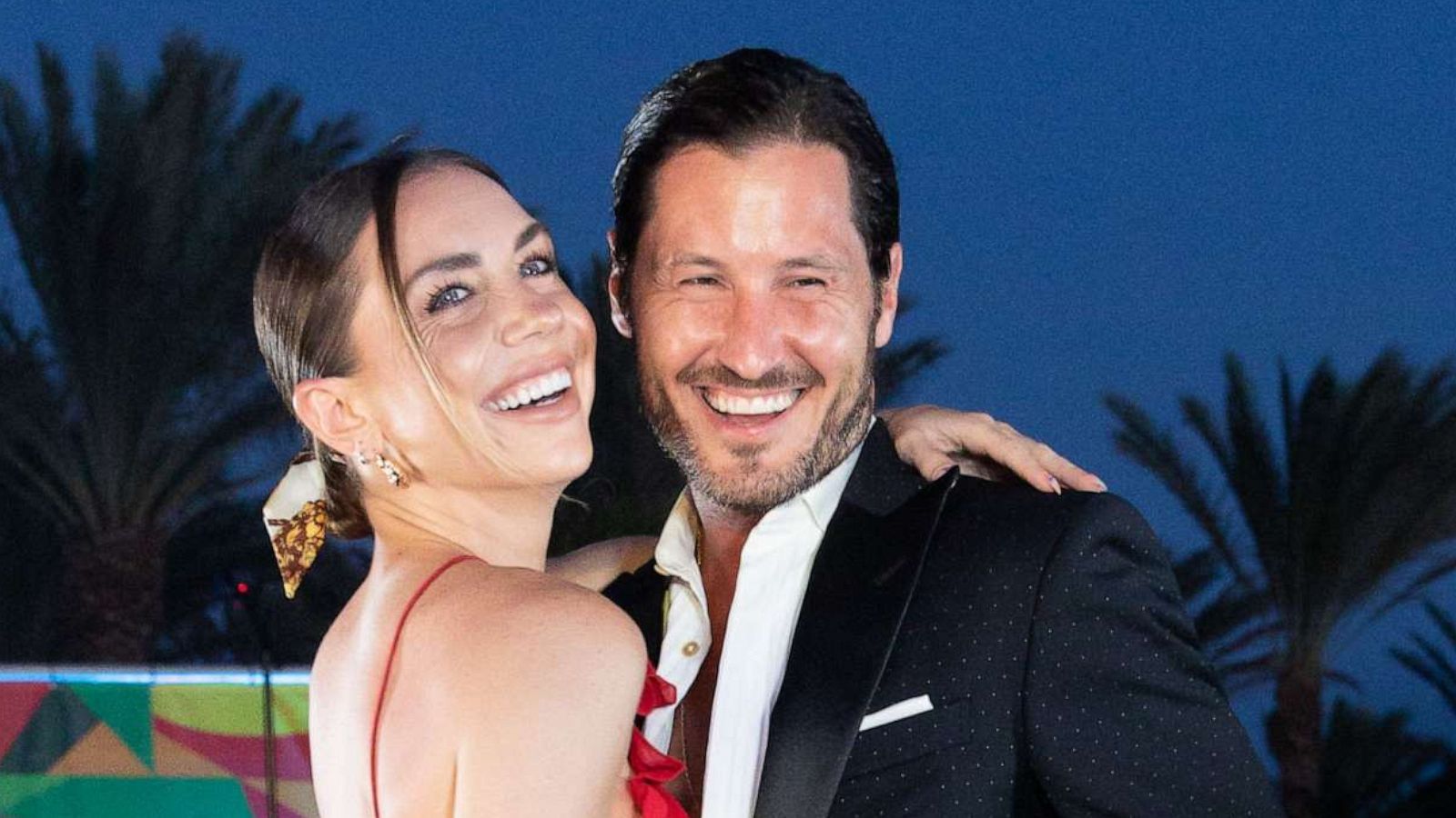 PHOTO: Dancing with The Stars Jenna Johnson in a stunning red jumpsuit and Val Chmerkovskiy attend an event on June 24, 2022 in Santa Barbara, Curacao.