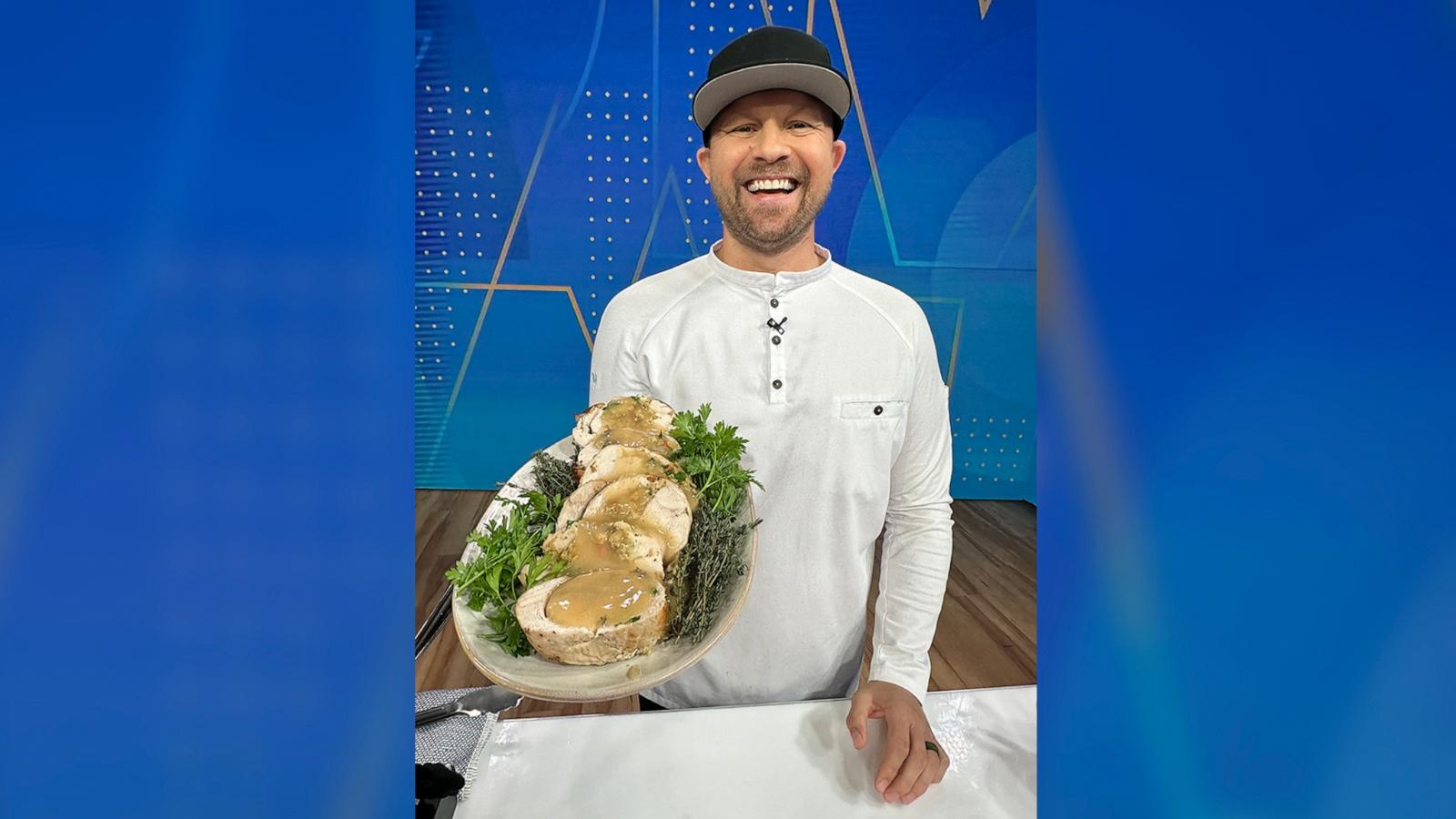 PHOTO: Chef Jeremy Ford holds a platter of stuffed turkey breast.