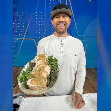 PHOTO: Chef Jeremy Ford holds a platter of stuffed turkey breast.