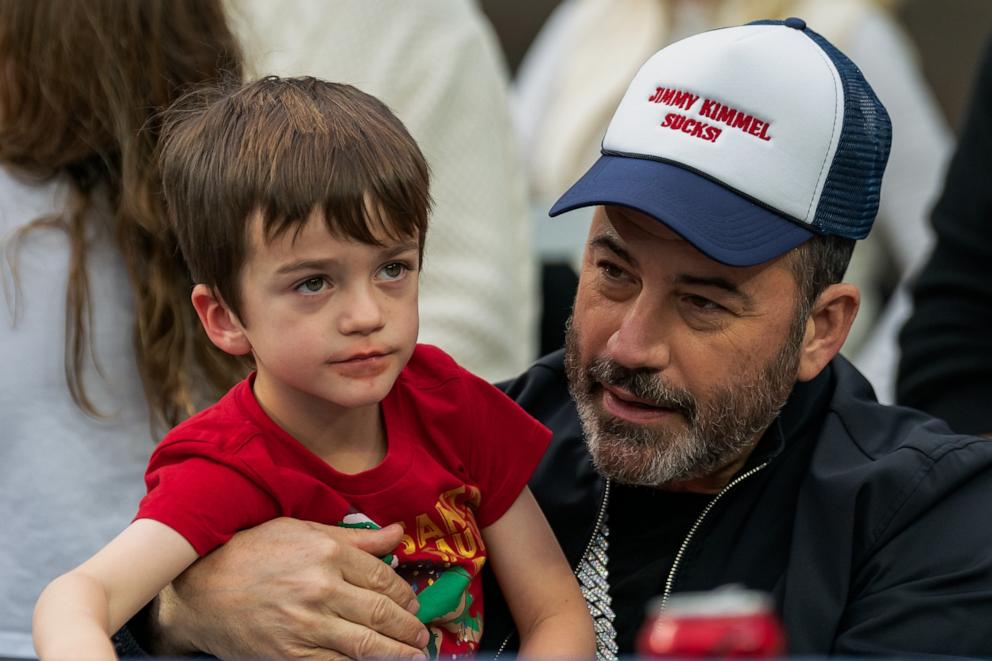 PHOTO: Jimmy Kimmel holds his son Billy Kimmel during the LA Bowl game between Washington State Cougars and Fresno State Bulldogs in Los Angeles, CA, Dec. 17, 2022.